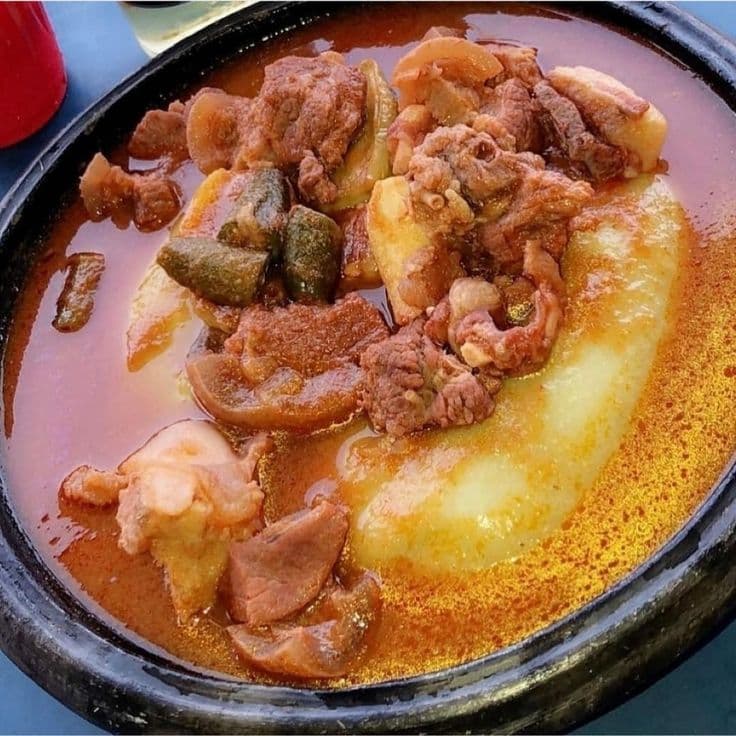 Fufu with Goat, Salmon & Beef